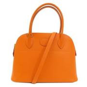 Pre-owned Fabric handbags Hermès Vintage , Orange , Dames