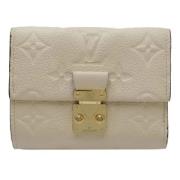 Pre-owned Fabric wallets Louis Vuitton Vintage , Beige , Dames