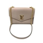 Pre-owned Fabric shoulder-bags Louis Vuitton Vintage , Beige , Dames