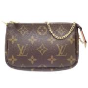 Pre-owned Canvas clutches Louis Vuitton Vintage , Brown , Dames