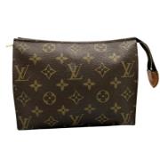 Pre-owned Canvas pouches Louis Vuitton Vintage , Brown , Dames