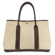 Pre-owned Fabric handbags Hermès Vintage , Beige , Dames