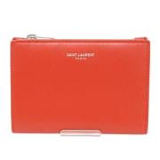 Pre-owned Leather wallets Yves Saint Laurent Vintage , Orange , Dames