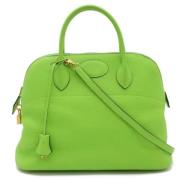 Pre-owned Leather handbags Hermès Vintage , Green , Dames