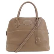 Pre-owned Leather handbags Hermès Vintage , Beige , Dames