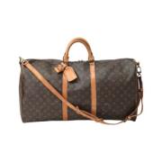 Pre-owned Canvas handbags Louis Vuitton Vintage , Brown , Dames