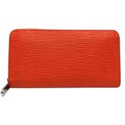 Pre-owned Fabric wallets Louis Vuitton Vintage , Orange , Dames