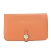 Pre-owned Leather wallets Hermès Vintage , Orange , Dames