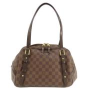 Pre-owned Canvas handbags Louis Vuitton Vintage , Brown , Dames