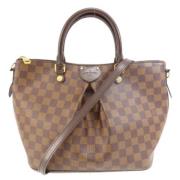 Pre-owned Fabric handbags Louis Vuitton Vintage , Brown , Dames