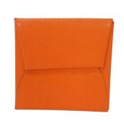 Pre-owned Leather wallets Hermès Vintage , Orange , Dames