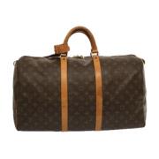 Pre-owned Canvas handbags Louis Vuitton Vintage , Brown , Dames