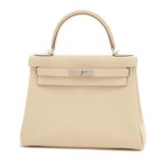 Pre-owned Leather handbags Hermès Vintage , Beige , Dames