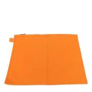 Pre-owned Canvas pouches Hermès Vintage , Orange , Dames