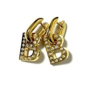 Pre-owned Metal earrings Balenciaga Vintage , Yellow , Dames