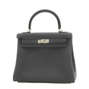 Pre-owned Leather handbags Hermès Vintage , Black , Dames