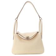 Pre-owned Leather handbags Hermès Vintage , Beige , Dames