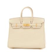 Pre-owned Leather handbags Hermès Vintage , Beige , Dames