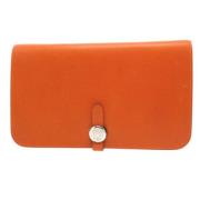 Pre-owned Leather wallets Hermès Vintage , Orange , Dames