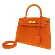 Pre-owned Fabric handbags Hermès Vintage , Orange , Dames