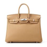 Pre-owned Leather handbags Hermès Vintage , Beige , Dames