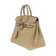 Pre-owned Leather handbags Hermès Vintage , Beige , Dames