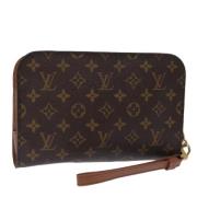 Pre-owned Canvas clutches Louis Vuitton Vintage , Brown , Dames