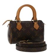 Pre-owned Canvas handbags Louis Vuitton Vintage , Brown , Dames