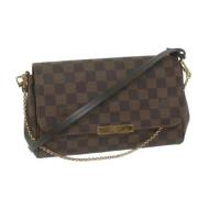 Pre-owned Canvas shoulder-bags Louis Vuitton Vintage , Brown , Dames