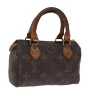 Pre-owned Canvas handbags Louis Vuitton Vintage , Brown , Dames