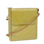 Pre-owned Leather pouches Louis Vuitton Vintage , Beige , Dames