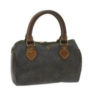 Pre-owned Canvas handbags Louis Vuitton Vintage , Brown , Dames