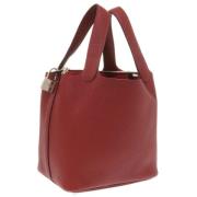 Pre-owned Leather handbags Hermès Vintage , Red , Dames