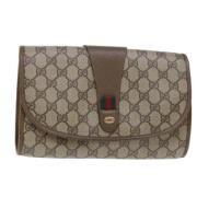 Pre-owned Leather clutches Gucci Vintage , Beige , Dames