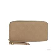 Pre-owned Leather wallets Louis Vuitton Vintage , Beige , Dames