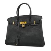 Pre-owned Fabric handbags Hermès Vintage , Black , Dames