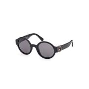 Chique ronde zonnebril met pantograaf frame Moncler , Black , Dames