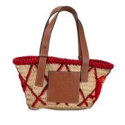 Pre-owned Raffia totes Loewe Pre-owned , Beige , Dames