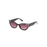 Stijlvolle zonnebril met Bordeaux Gradiënt Lens Guess , Black , Dames