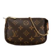 Pre-owned Canvas clutches Louis Vuitton Vintage , Brown , Dames