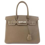 Pre-owned Leather handbags Hermès Vintage , Beige , Dames