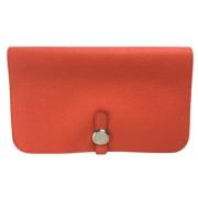 Pre-owned Leather wallets Hermès Vintage , Orange , Dames