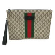 Pre-owned Canvas clutches Gucci Vintage , Beige , Dames