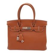 Pre-owned Leather handbags Hermès Vintage , Brown , Dames