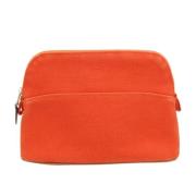 Pre-owned Cotton pouches Hermès Vintage , Orange , Dames