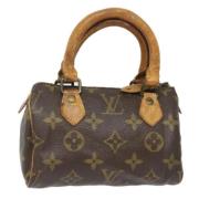 Pre-owned Canvas handbags Louis Vuitton Vintage , Brown , Dames