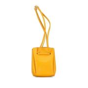 Pre-owned Leather clutches Hermès Vintage , Yellow , Dames