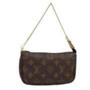 Pre-owned Canvas clutches Louis Vuitton Vintage , Brown , Dames