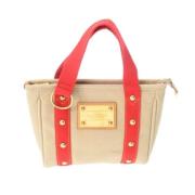 Pre-owned Canvas handbags Louis Vuitton Vintage , Beige , Dames