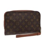 Pre-owned Canvas clutches Louis Vuitton Vintage , Brown , Dames